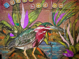 Colorful heron art made out of recycled materials