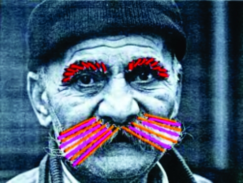Black and white photo of man with pink string mustache