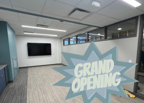 Photo of community space with words Grand Opening