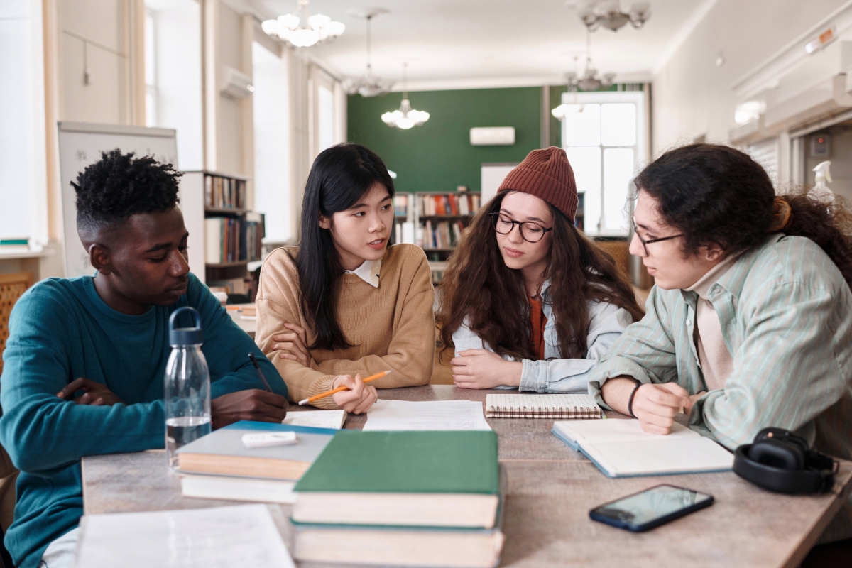 Teenagers in a group studying