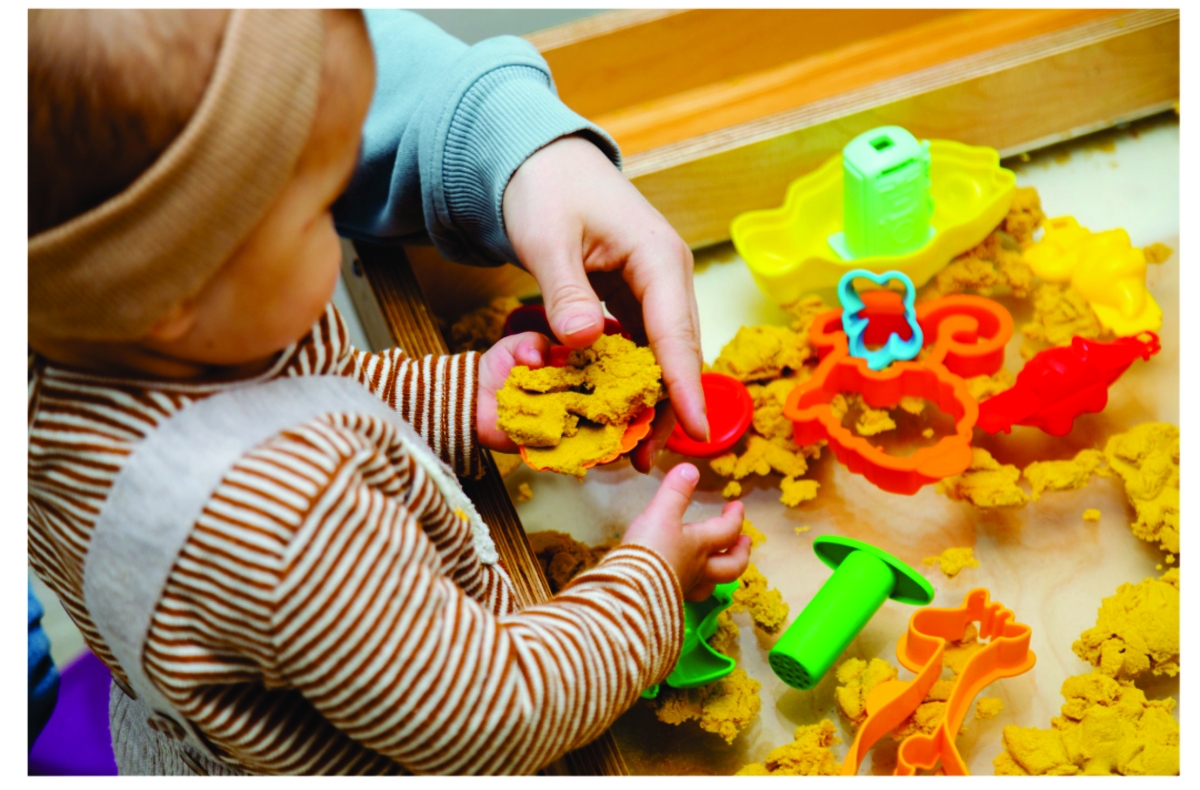 You child playing with play dough