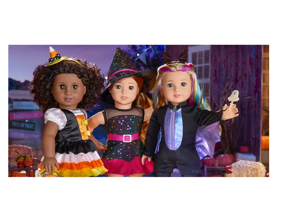 3 American Girl dolls dressed in Halloween costumes.