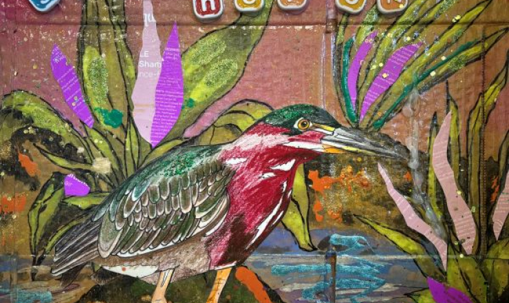 Colorful heron art made out of recycled materials